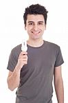 Man Holding Lightbulb Stock Photo