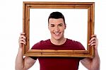 Man Holding Wooden Picture Frame Stock Photo