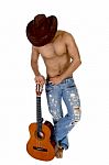 Man In Cowboy Hat Holding Guitar Stock Photo