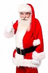 Man In Santa Costume Giving Best Wishes Stock Photo