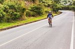 Man, On The Bicycle On The Road In Nicaragua Mountains Stock Photo