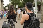 Man Photographing Girl On Street Stock Photo