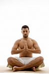 Man Practicing Yoga Stock Photo