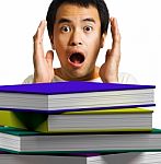 Man Shocking With Looking Books Stock Photo