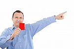 Man Shows Someone A Red Card. All Isolated On White Background Stock Photo