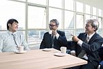 Man Talking With Happiness And Relaxing Emotion ,business People And Office Life Theme Stock Photo