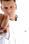 Man Wearing Chef Uniform With A Forward Fist Stock Photo