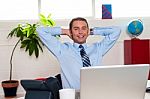 Manager Relaxing In His Office, Work Break Stock Photo