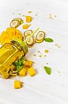 Mango And Banana Smoothie In Mason Jar With Straw Stock Photo