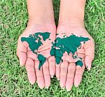 Map Of The World In Hands Stock Photo