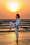 Martial Art Training At Sunset Stock Photo