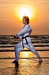 Martial Art Training On Beach Stock Photo