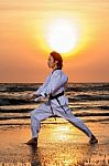 Martial Arts Training On Beach Stock Photo