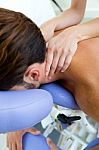 Masseur Doing Massage On Man Body In The Spa Salon Stock Photo