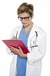 Medical Practitioner Writing Prescription Stock Photo