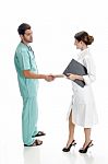 Medical Professionals Shaking Hands Stock Photo