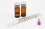 Medicine Vials And Syringe Isolated On White Background Stock Photo