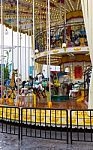 Merry Go Round In Amusement Park Stock Photo