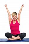 Middle Age Woman With Arms Raised Stock Photo