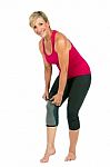 Middle Age Woman With 
Patellar Knee Brace Stock Photo