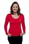 Middle Aged Woman In Bright Red Top Stock Photo