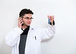 Scientist And Test-results Stock Photo