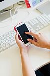Mobile Phone In A Woman's Hand. Indoor Image Stock Photo