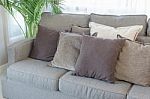 Modern Grey Sofa With Pillows Stock Photo