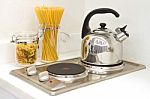 Modern Kitchen. Steel Pot And Pan On The Induction Cooker Stock Photo