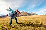 Mother Carries Daughter On Her Back  In Durmitor, Montenegro Stock Photo