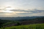 
Mountain Farm Tractors For Planting Crops. And Partially Covere Stock Photo