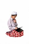 Muslim Boy Eating Stock Photo