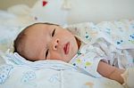 Newborn Asian Baby Asleep Stock Photo