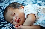 Newborn Baby Peacefully Sleeping Stock Photo