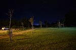 Night Public Park In The City With Houses Near Stock Photo