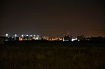 Night Public Park In The City With Houses Near Stock Photo