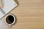 Note Book With Coffee Cup Stock Photo