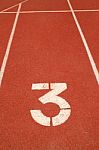 Number 3 On Running Track Stock Photo