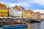 Nyhavn, 17th Century Waterfront, Canal And Entertainment District And The Popular Tourist Destination In Copenhagen, Denmark Stock Photo
