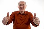 Old Man Showing Thumbs Up Stock Photo