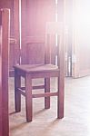 Old Style Wooden Chair In Coffee Shop With Vintage Filter Stock Photo
