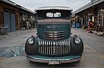 Old Vintage Green Chevrolet Truck At Night Market, Srinakarin Ro Stock Photo