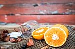Oranges Cut Set On Old Wooden Background Stock Photo
