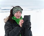 Woman Typing On Her Cell-phone Outdoor Stock Photo