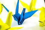 Origami Birds Demonstrate Think Different Concept. Bird Paper Folding Stock Photo