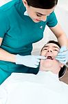 Patient Getting Dental Checkup Stock Photo