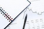 Pen, Notebook, Financial Report Stock Photo