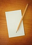 Pencil And Notepad Stock Photo