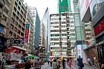 People Are Walking Around The Peking Road In Tsim Sha Tsui, Kowloon, Hong Kong Stock Photo
