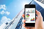 Phone With Analyzing Graph Stock Photo